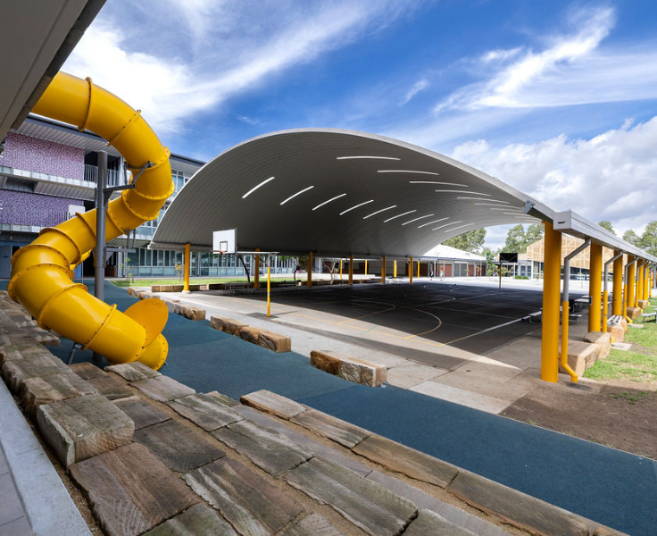 A wide angled view of the school COLA with a curvy slippery dip to the left